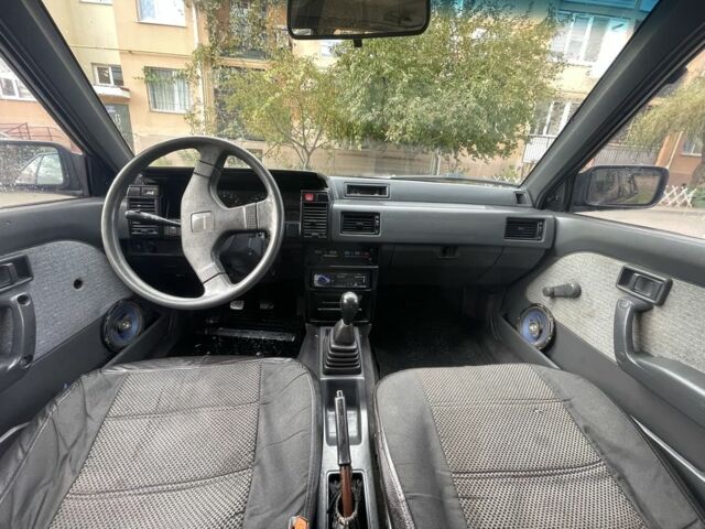 Зеленый Ниссан Санни, объемом двигателя 1.6 л и пробегом 288 тыс. км за 880 $, фото 5 на Automoto.ua