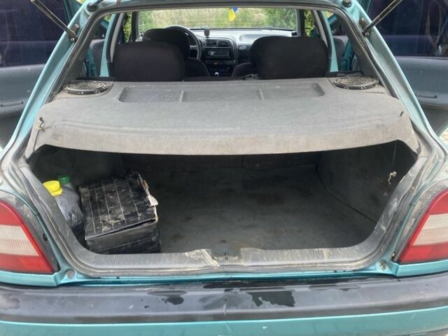 Зеленый Ниссан Санни, объемом двигателя 1.4 л и пробегом 580 тыс. км за 1250 $, фото 7 на Automoto.ua