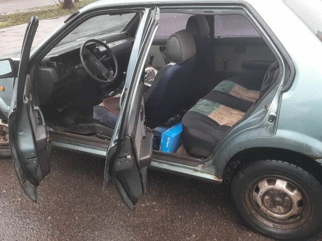 Зеленый Ниссан Санни, объемом двигателя 1.7 л и пробегом 300 тыс. км за 758 $, фото 5 на Automoto.ua