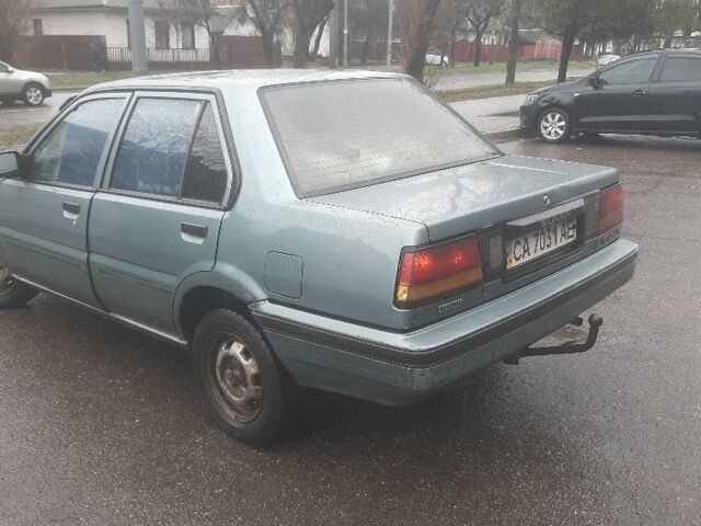 Зеленый Ниссан Санни, объемом двигателя 1.7 л и пробегом 300 тыс. км за 758 $, фото 1 на Automoto.ua