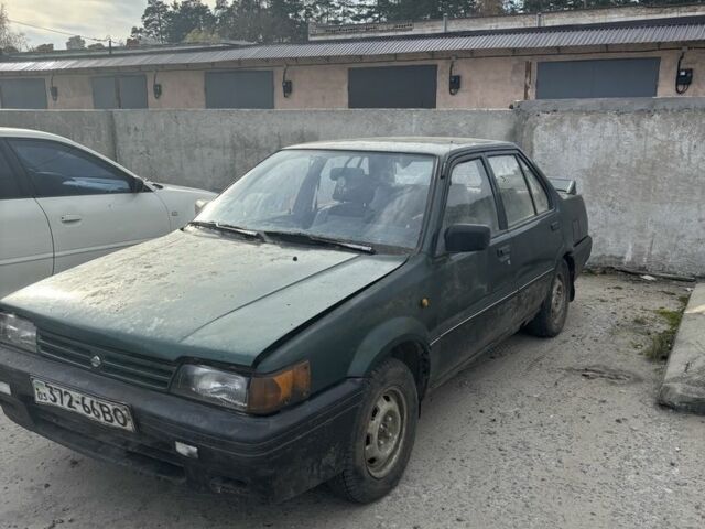 Зелений Ніссан Санні, об'ємом двигуна 1.4 л та пробігом 400 тис. км за 850 $, фото 1 на Automoto.ua