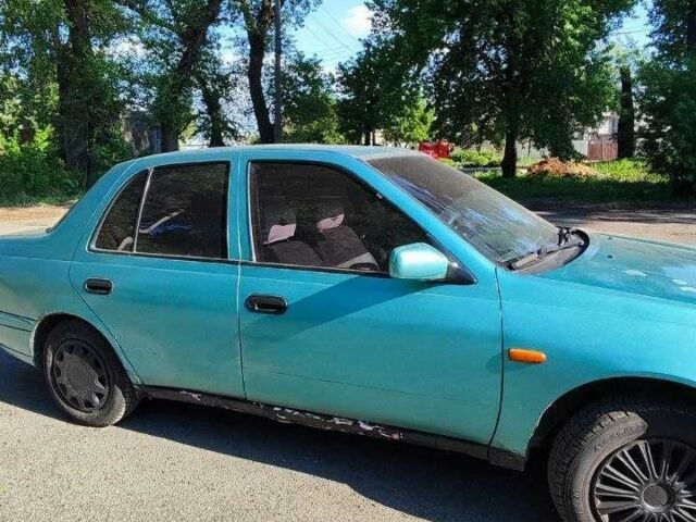 Зеленый Ниссан Санни, объемом двигателя 1.6 л и пробегом 226 тыс. км за 1100 $, фото 9 на Automoto.ua