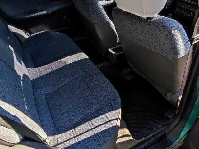 Зеленый Ниссан Санни, объемом двигателя 1.6 л и пробегом 226 тыс. км за 1100 $, фото 21 на Automoto.ua