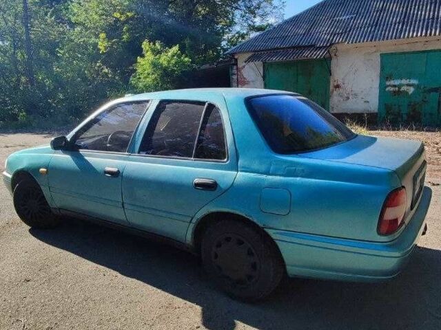 Зеленый Ниссан Санни, объемом двигателя 1.6 л и пробегом 226 тыс. км за 1100 $, фото 6 на Automoto.ua