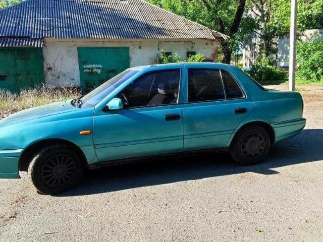 Зеленый Ниссан Санни, объемом двигателя 1.6 л и пробегом 226 тыс. км за 1100 $, фото 5 на Automoto.ua