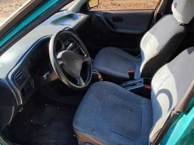 Зеленый Ниссан Санни, объемом двигателя 1.6 л и пробегом 226 тыс. км за 1100 $, фото 19 на Automoto.ua