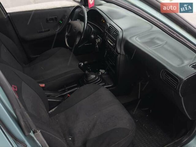 Зеленый Ниссан Санни, объемом двигателя 1.4 л и пробегом 444 тыс. км за 1300 $, фото 13 на Automoto.ua