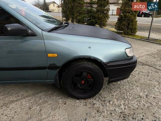 Зелений Ніссан Санні, об'ємом двигуна 1.4 л та пробігом 333 тис. км за 1644 $, фото 19 на Automoto.ua