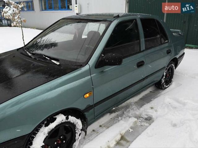 Зеленый Ниссан Санни, объемом двигателя 1.4 л и пробегом 444 тыс. км за 1300 $, фото 12 на Automoto.ua