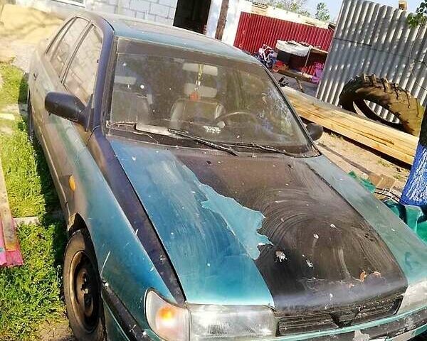 Зелений Ніссан Санні, об'ємом двигуна 1.4 л та пробігом 380 тис. км за 1100 $, фото 2 на Automoto.ua