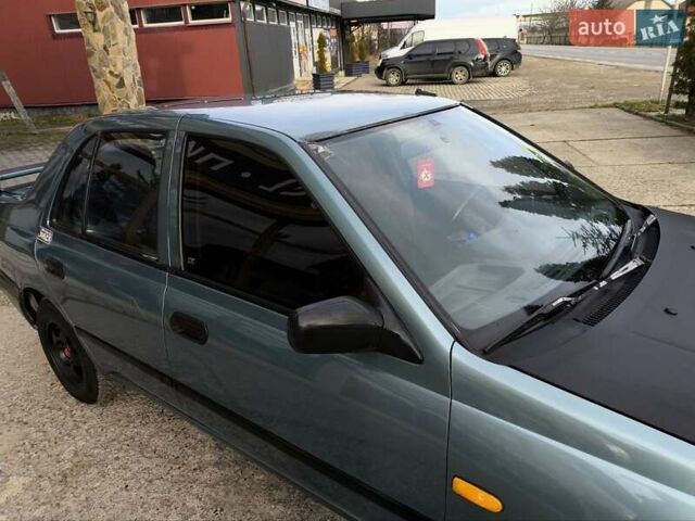 Зелений Ніссан Санні, об'ємом двигуна 1.4 л та пробігом 333 тис. км за 1644 $, фото 18 на Automoto.ua