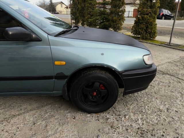 Зелений Ніссан Санні, об'ємом двигуна 1.4 л та пробігом 444 тис. км за 1649 $, фото 2 на Automoto.ua