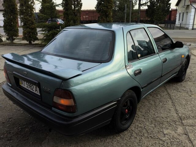 Зелений Ніссан Санні, об'ємом двигуна 1.4 л та пробігом 444 тис. км за 1649 $, фото 5 на Automoto.ua