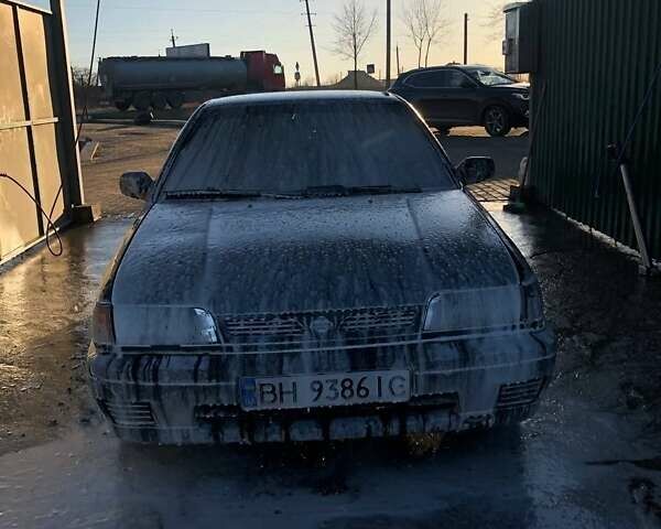 Зеленый Ниссан Санни, объемом двигателя 1.4 л и пробегом 312 тыс. км за 850 $, фото 2 на Automoto.ua