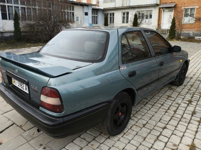 Зелений Ніссан Санні, об'ємом двигуна 1.4 л та пробігом 444 тис. км за 1649 $, фото 16 на Automoto.ua