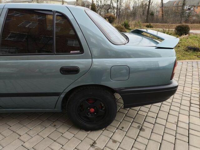 Зелений Ніссан Санні, об'ємом двигуна 1.4 л та пробігом 444 тис. км за 1649 $, фото 14 на Automoto.ua