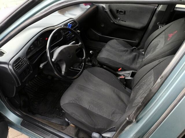 Зелений Ніссан Санні, об'ємом двигуна 1.4 л та пробігом 444 тис. км за 1649 $, фото 22 на Automoto.ua