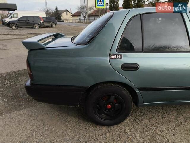Зелений Ніссан Санні, об'ємом двигуна 1.4 л та пробігом 333 тис. км за 1644 $, фото 16 на Automoto.ua