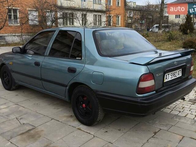 Зелений Ніссан Санні, об'ємом двигуна 1.4 л та пробігом 333 тис. км за 1644 $, фото 5 на Automoto.ua