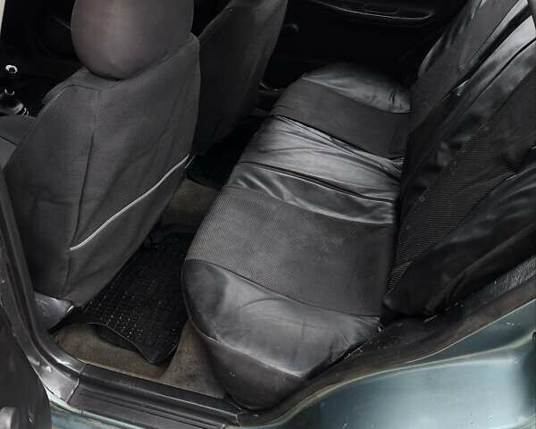 Зелений Ніссан Санні, об'ємом двигуна 1.4 л та пробігом 333 тис. км за 1644 $, фото 13 на Automoto.ua