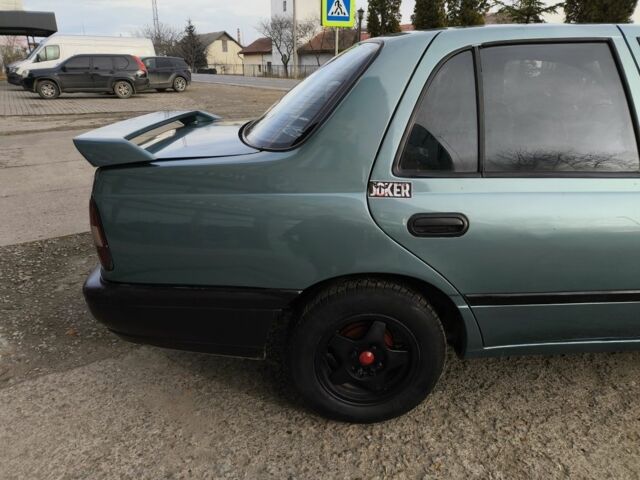 Зелений Ніссан Санні, об'ємом двигуна 1.4 л та пробігом 444 тис. км за 1649 $, фото 3 на Automoto.ua