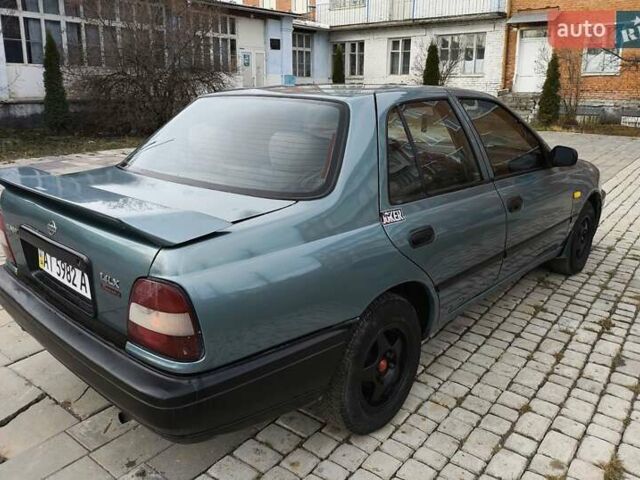 Зелений Ніссан Санні, об'ємом двигуна 1.4 л та пробігом 333 тис. км за 1644 $, фото 6 на Automoto.ua