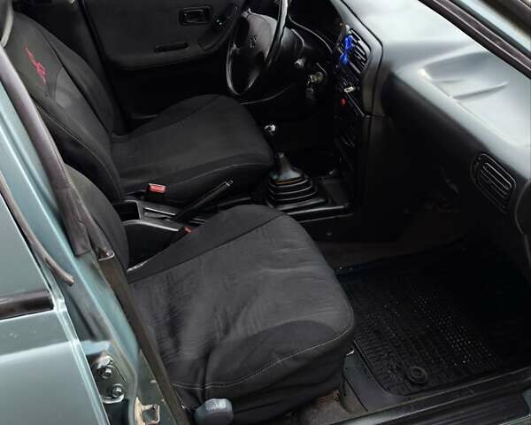 Зелений Ніссан Санні, об'ємом двигуна 1.4 л та пробігом 333 тис. км за 1644 $, фото 7 на Automoto.ua