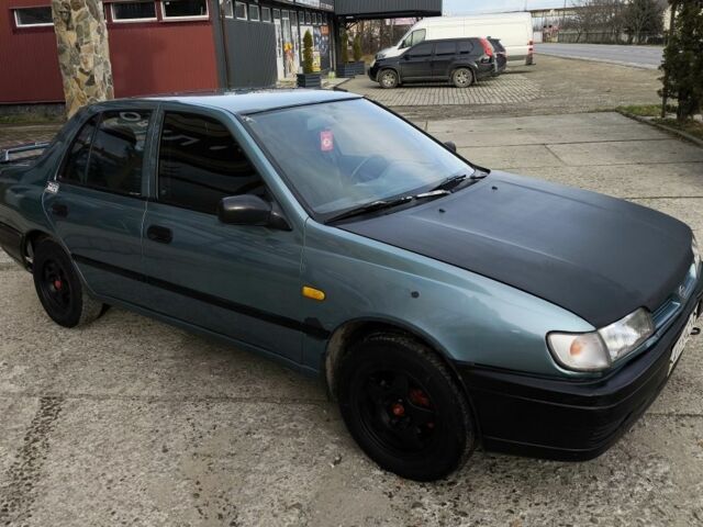 Зелений Ніссан Санні, об'ємом двигуна 1.4 л та пробігом 444 тис. км за 1649 $, фото 4 на Automoto.ua