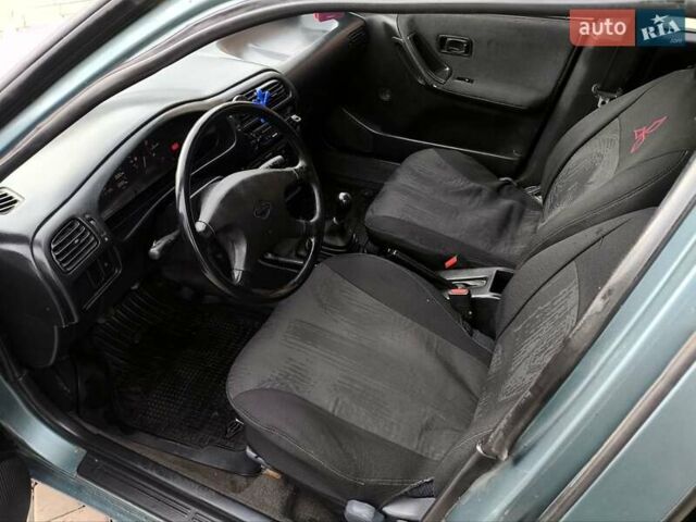 Зелений Ніссан Санні, об'ємом двигуна 1.4 л та пробігом 333 тис. км за 1644 $, фото 24 на Automoto.ua