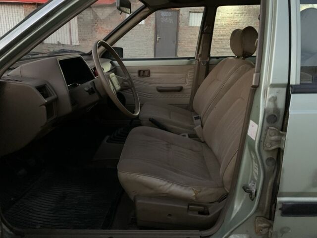 Зеленый Ниссан Санни, объемом двигателя 1.3 л и пробегом 280 тыс. км за 358 $, фото 7 на Automoto.ua