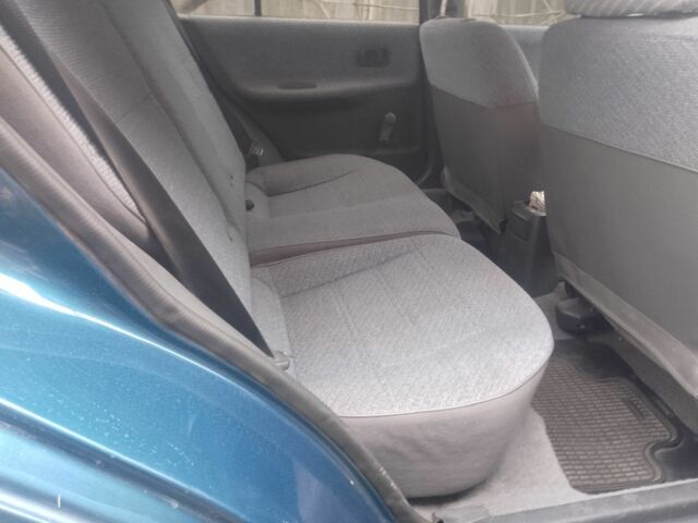 Зеленый Ниссан Санни, объемом двигателя 1.4 л и пробегом 327 тыс. км за 1600 $, фото 5 на Automoto.ua