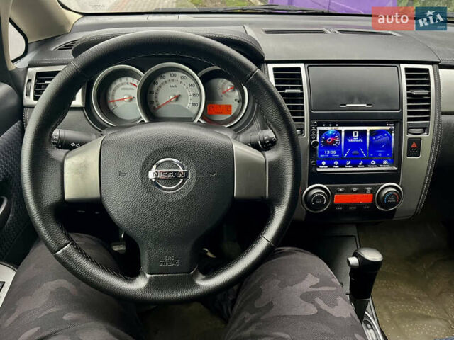 Белый Ниссан Тиида, объемом двигателя 1.5 л и пробегом 91 тыс. км за 7499 $, фото 26 на Automoto.ua