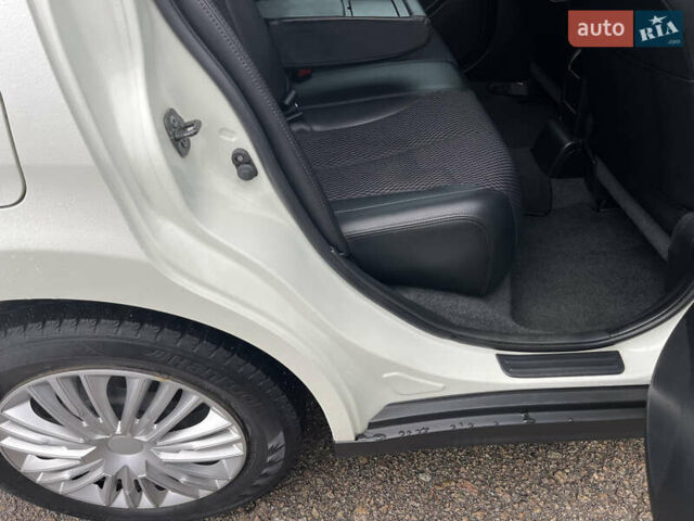 Белый Ниссан Тиида, объемом двигателя 1.5 л и пробегом 91 тыс. км за 7499 $, фото 15 на Automoto.ua