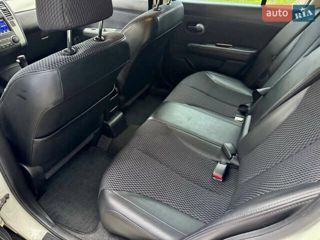 Белый Ниссан Тиида, объемом двигателя 1.5 л и пробегом 91 тыс. км за 7499 $, фото 34 на Automoto.ua