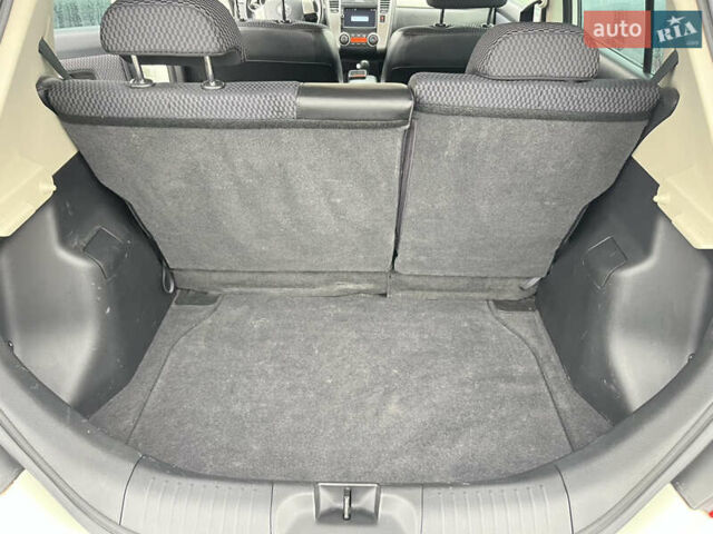 Белый Ниссан Тиида, объемом двигателя 1.5 л и пробегом 91 тыс. км за 7499 $, фото 9 на Automoto.ua