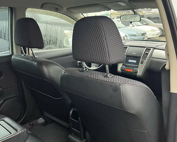 Белый Ниссан Тиида, объемом двигателя 1.5 л и пробегом 91 тыс. км за 7499 $, фото 42 на Automoto.ua