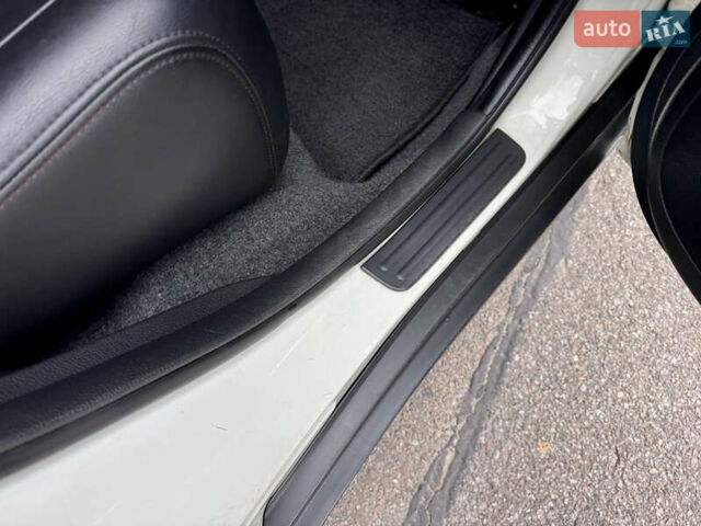 Белый Ниссан Тиида, объемом двигателя 1.5 л и пробегом 91 тыс. км за 7499 $, фото 39 на Automoto.ua