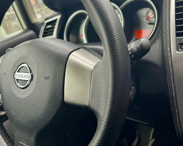 Белый Ниссан Тиида, объемом двигателя 1.5 л и пробегом 91 тыс. км за 7499 $, фото 27 на Automoto.ua