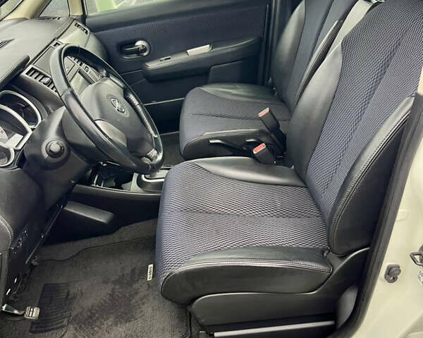 Белый Ниссан Тиида, объемом двигателя 1.5 л и пробегом 91 тыс. км за 7499 $, фото 18 на Automoto.ua