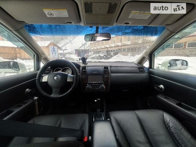 Белый Ниссан Тиида, объемом двигателя 1.5 л и пробегом 161 тыс. км за 5500 $, фото 5 на Automoto.ua