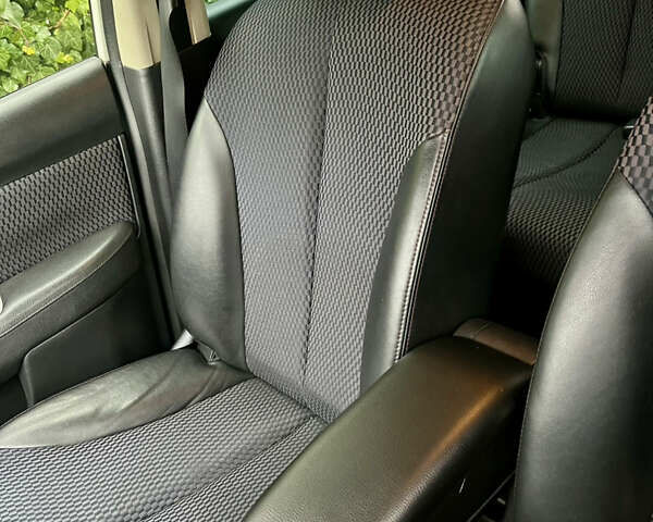 Белый Ниссан Тиида, объемом двигателя 1.5 л и пробегом 91 тыс. км за 7499 $, фото 24 на Automoto.ua