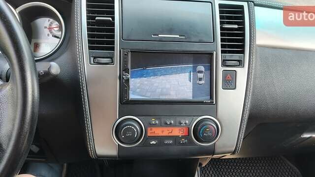 Белый Ниссан Тиида, объемом двигателя 1.5 л и пробегом 159 тыс. км за 8199 $, фото 8 на Automoto.ua