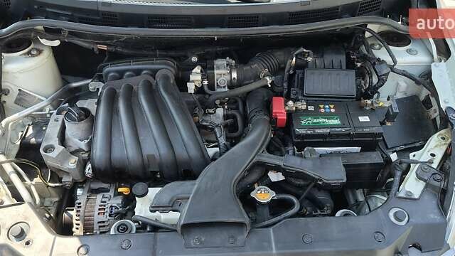 Белый Ниссан Тиида, объемом двигателя 1.5 л и пробегом 159 тыс. км за 8199 $, фото 9 на Automoto.ua