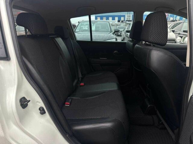 Белый Ниссан Тиида, объемом двигателя 1.5 л и пробегом 107 тыс. км за 7990 $, фото 14 на Automoto.ua