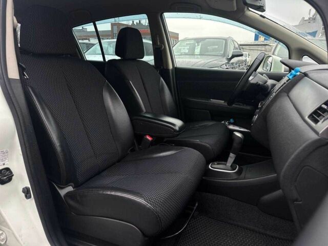 Белый Ниссан Тиида, объемом двигателя 1.5 л и пробегом 107 тыс. км за 7990 $, фото 11 на Automoto.ua