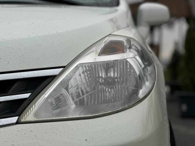 Белый Ниссан Тиида, объемом двигателя 1.5 л и пробегом 107 тыс. км за 7990 $, фото 1 на Automoto.ua