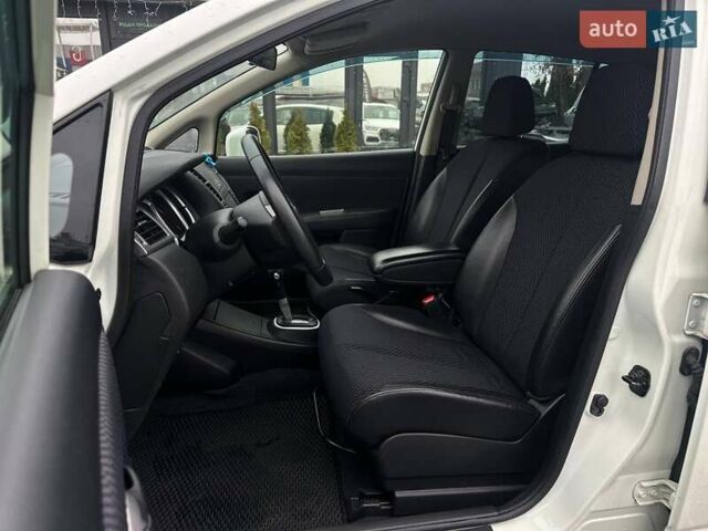 Белый Ниссан Тиида, объемом двигателя 1.5 л и пробегом 107 тыс. км за 7990 $, фото 10 на Automoto.ua