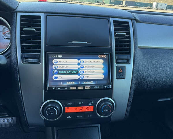 Белый Ниссан Тиида, объемом двигателя 1.5 л и пробегом 35 тыс. км за 8400 $, фото 14 на Automoto.ua