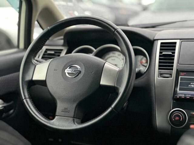 Белый Ниссан Тиида, объемом двигателя 1.5 л и пробегом 107 тыс. км за 7990 $, фото 16 на Automoto.ua