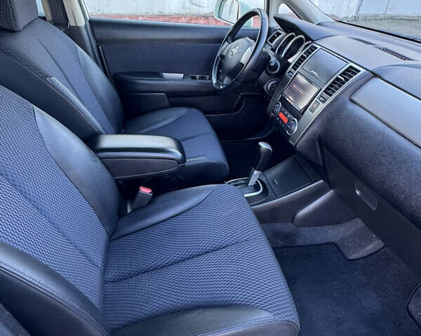 Белый Ниссан Тиида, объемом двигателя 1.5 л и пробегом 35 тыс. км за 8400 $, фото 10 на Automoto.ua